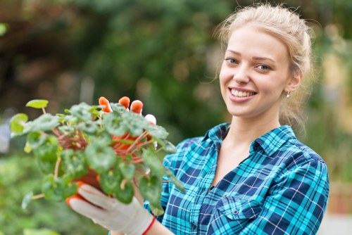Experienced gardeners working in a Penge garden